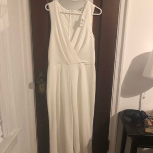 White jump suit with plunge neck